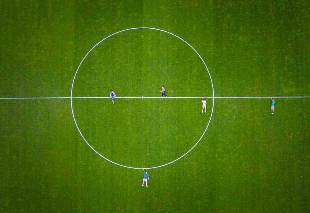 a group of men playing football