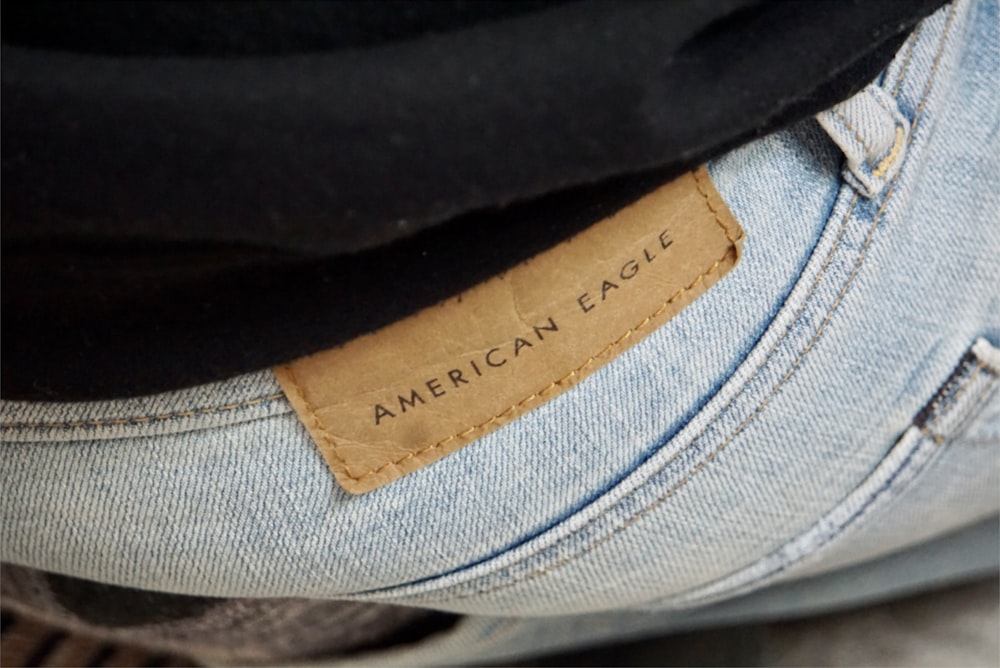 a close-up of a person's jeans pocket