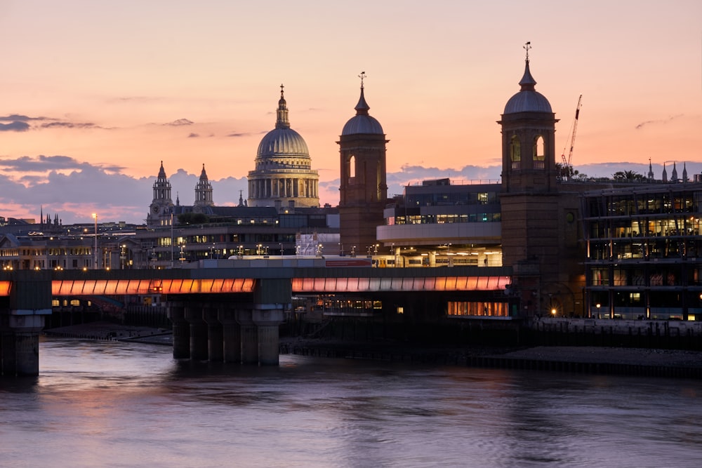 St Paul's Cathedral over a river with buildings in the background