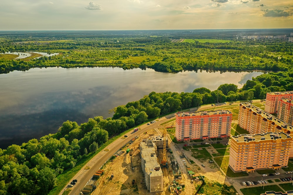 a river with a city and trees