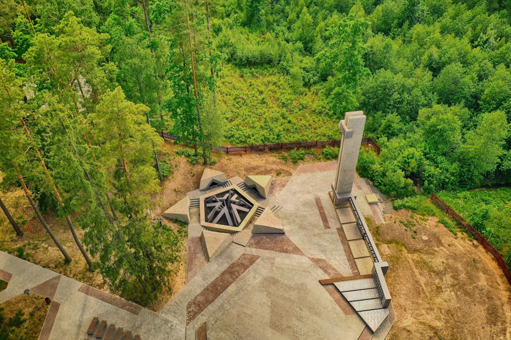 a stone structure surrounded by trees