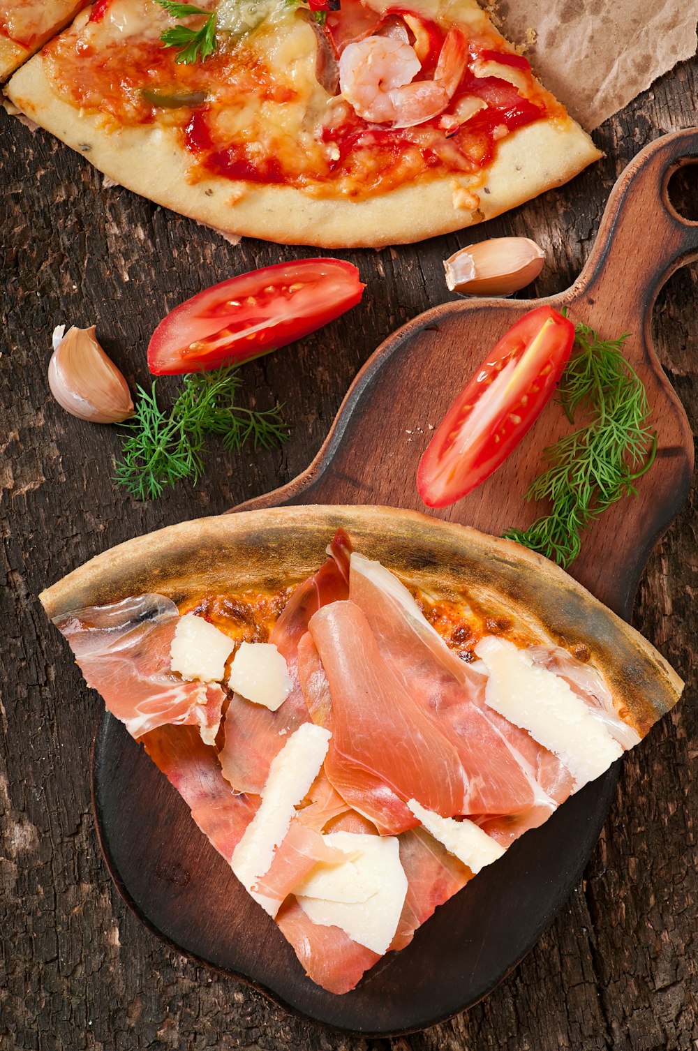 a pizza with tomatoes and cheese