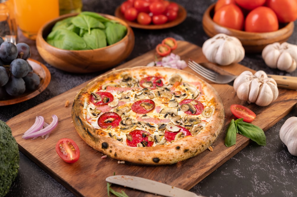 a pizza on a cutting board