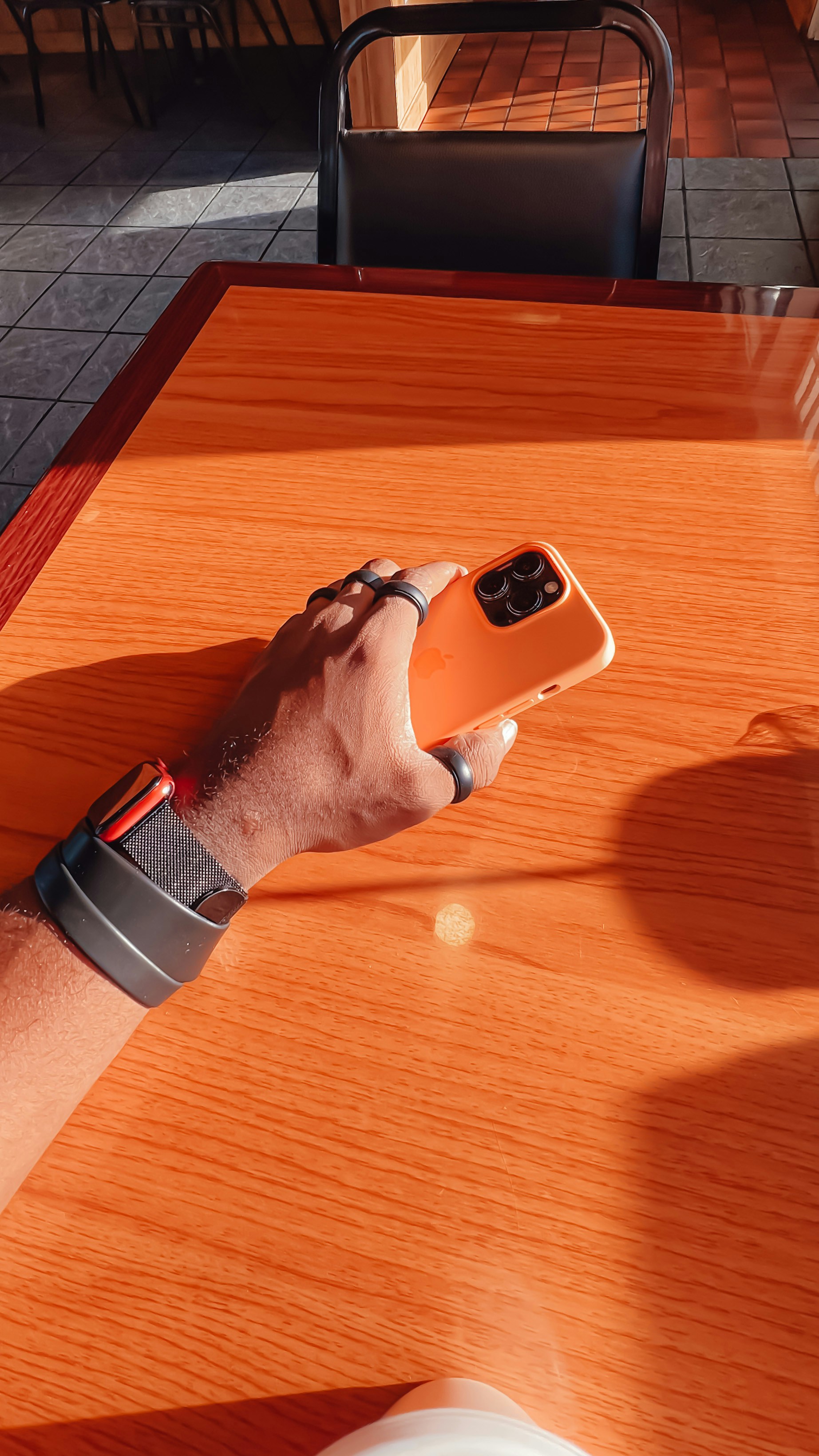 a person's foot on a table