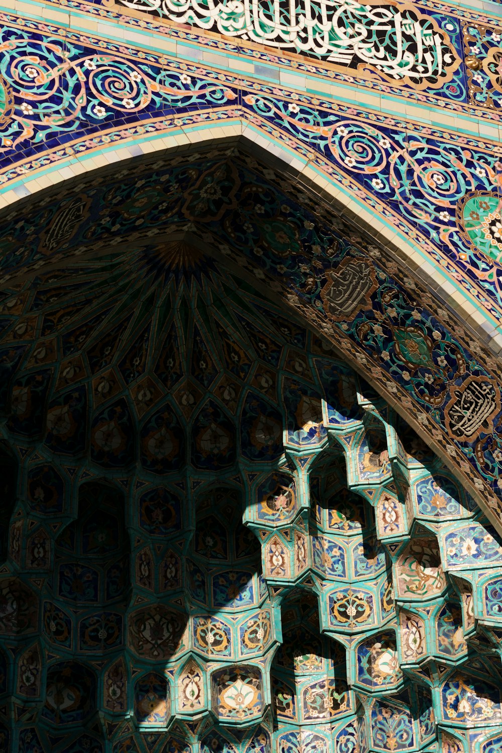 a large ornate ceiling with a statue