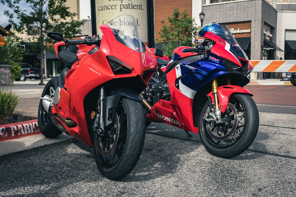 a red motorcycle parked on the street