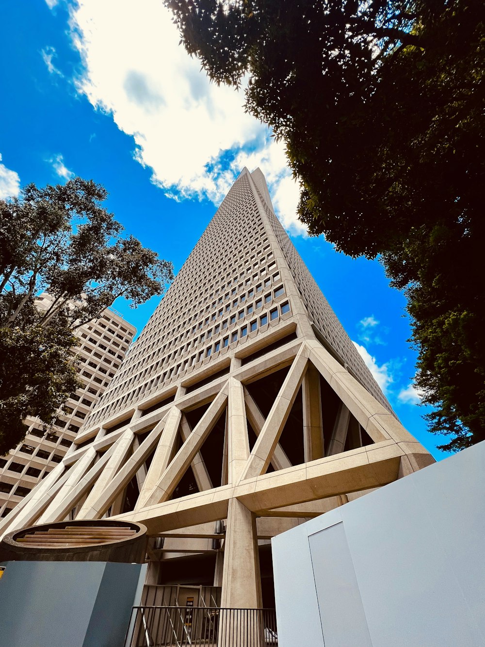 a tall building with a pointed roof