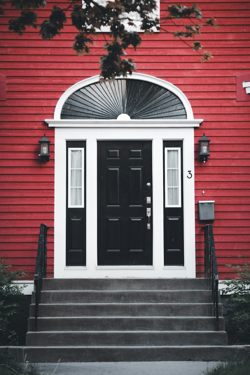 a red building with a black door