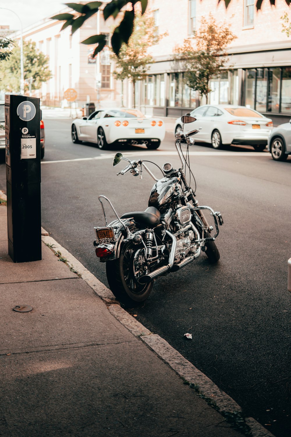 a motorcycle parked on the side of a street