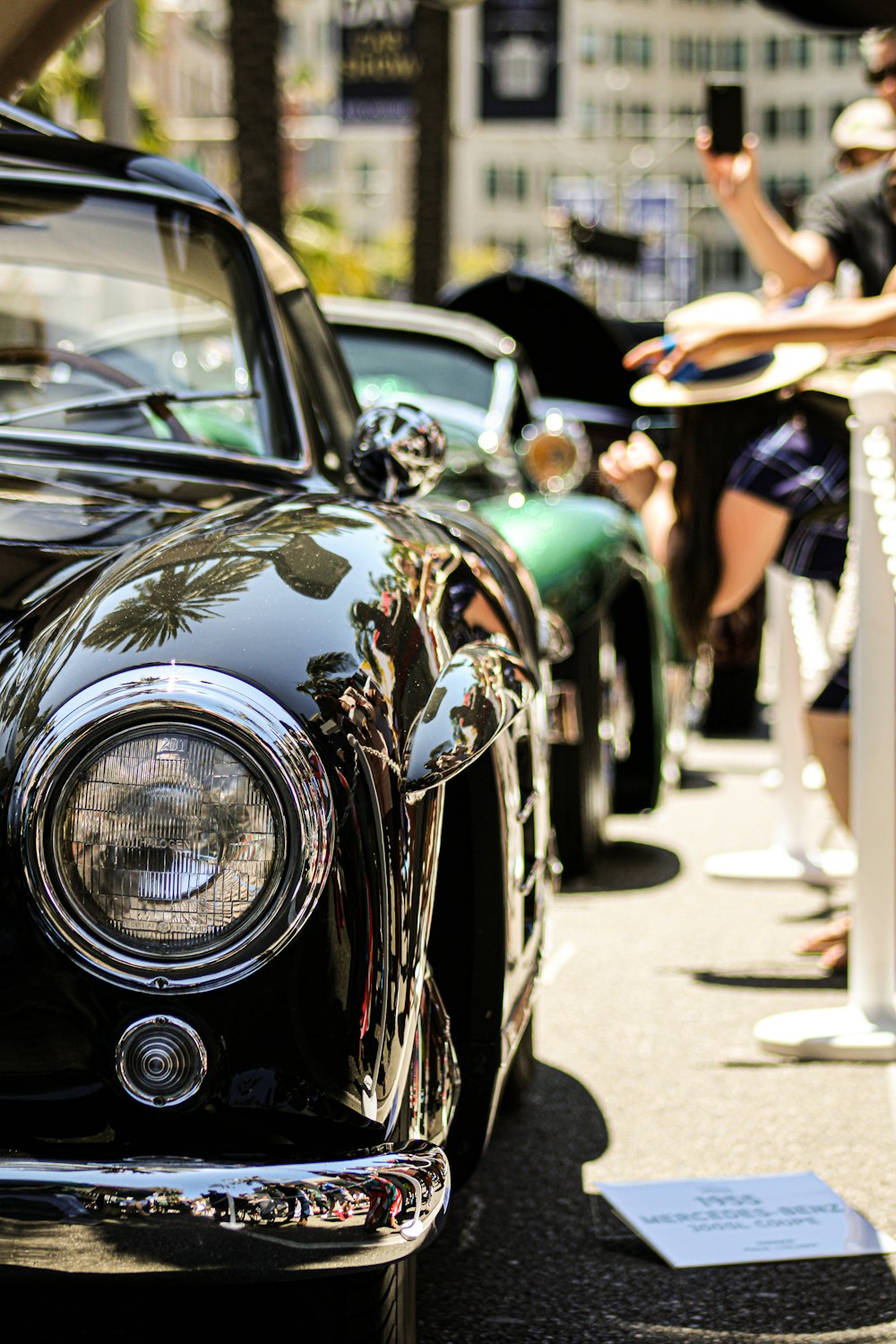 a group of cars parked on the side of a street