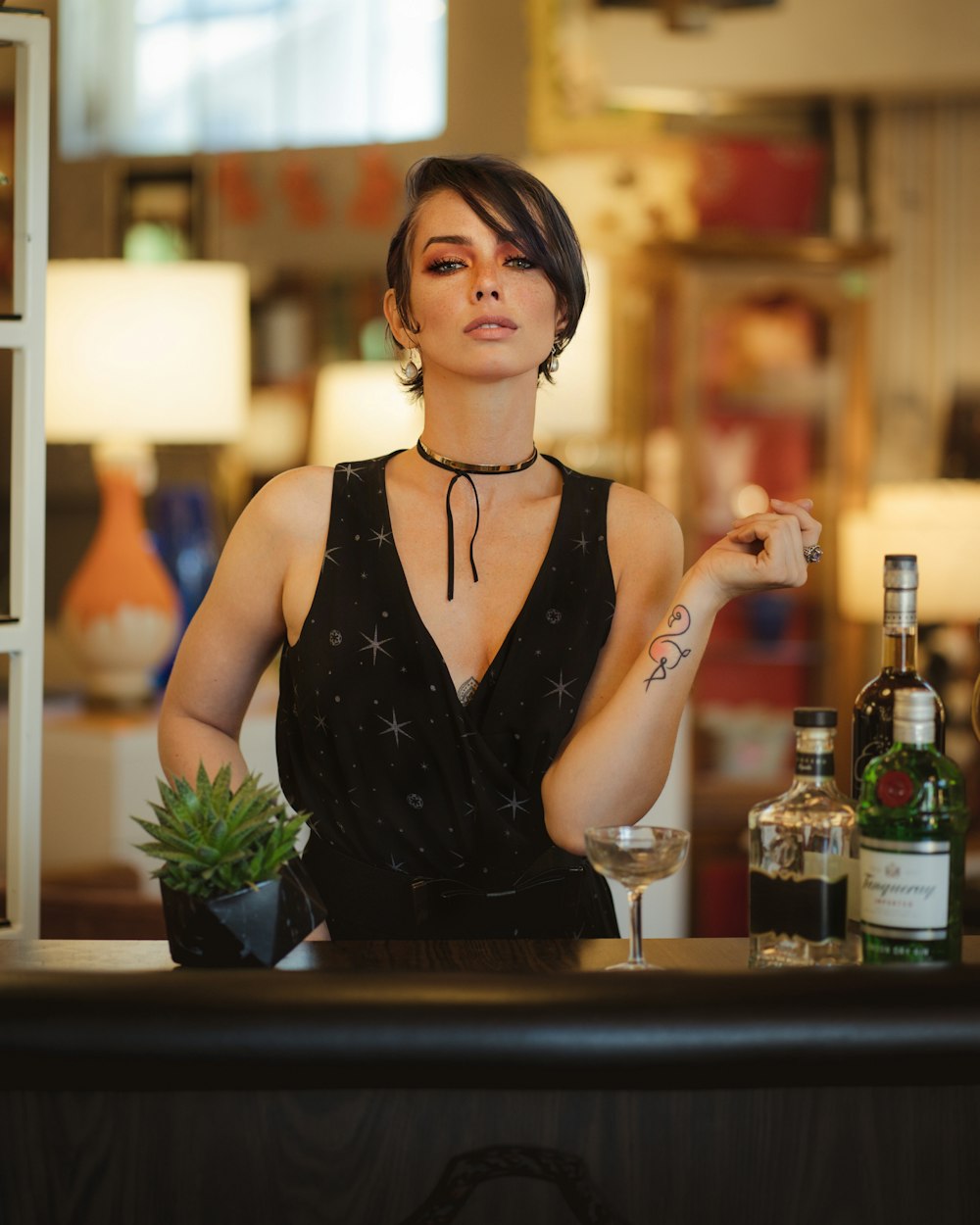 a woman sitting at a bar