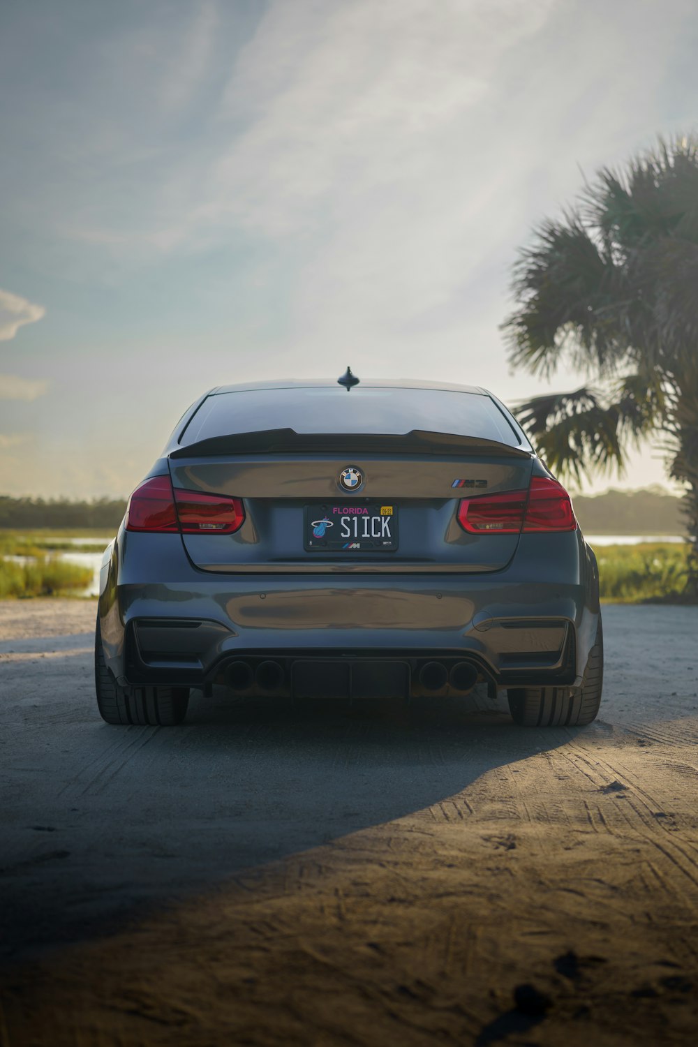 a car parked on a dirt road