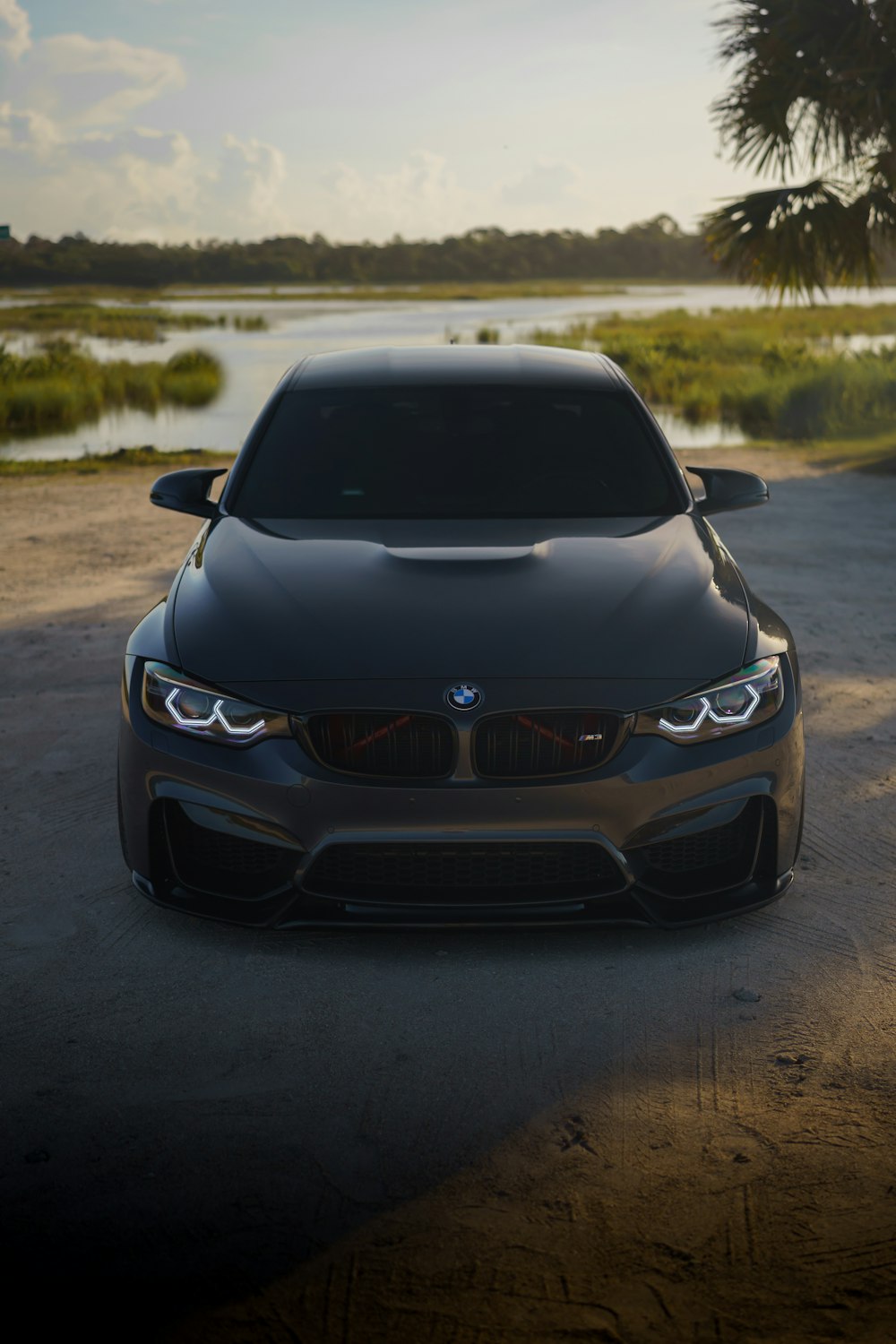 a car parked on a dirt road