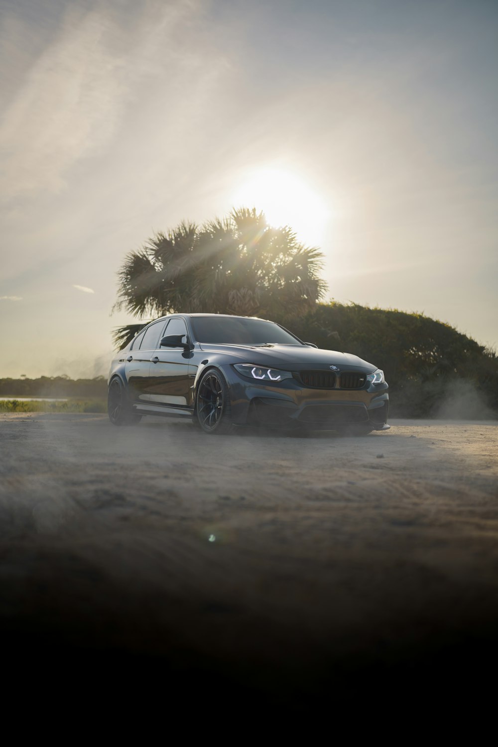 a car parked on a dirt road