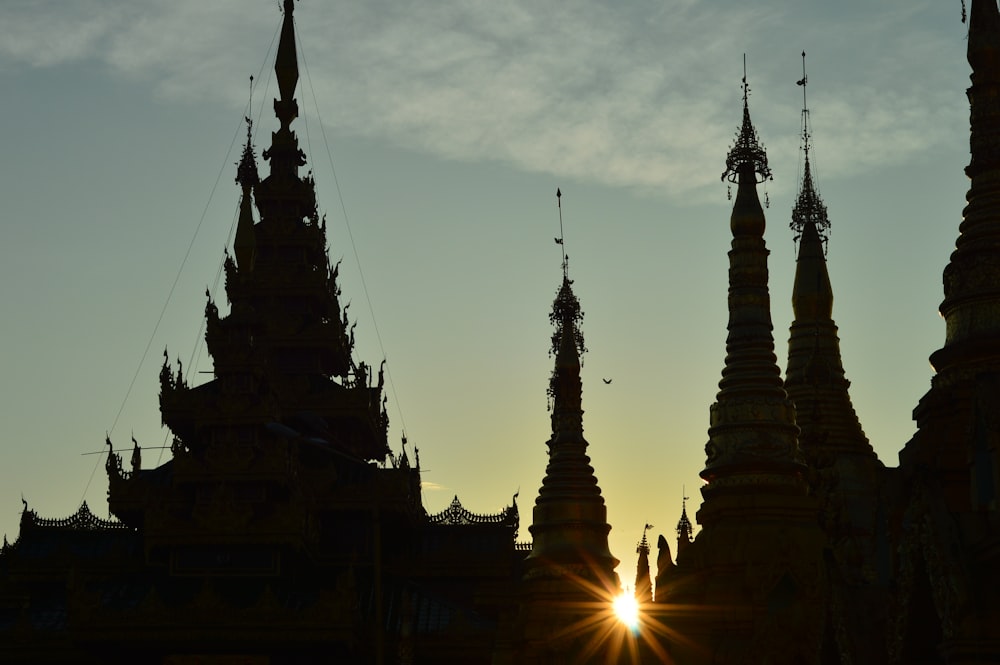 a group of towers with spires