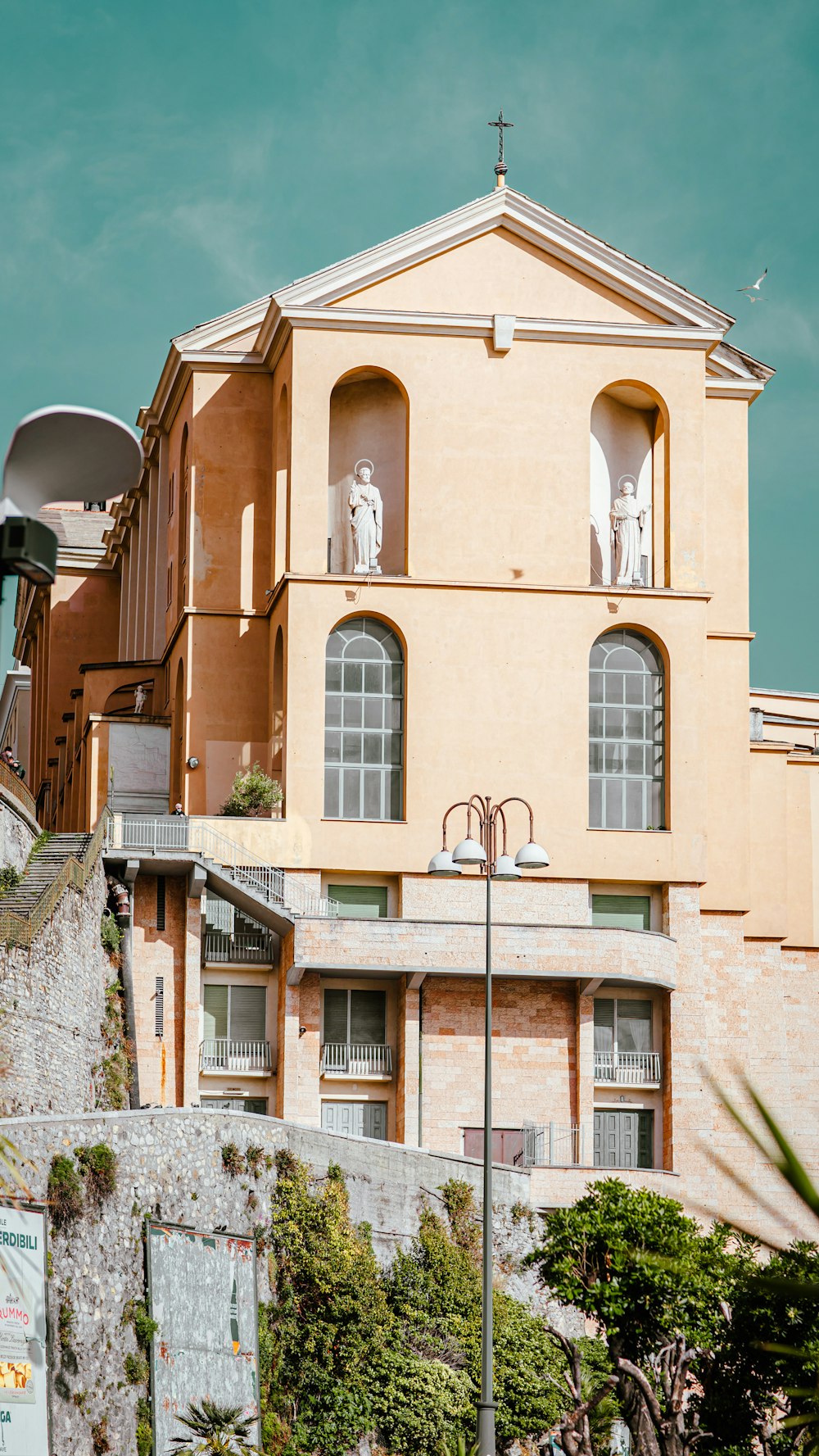 a building with a statue on top