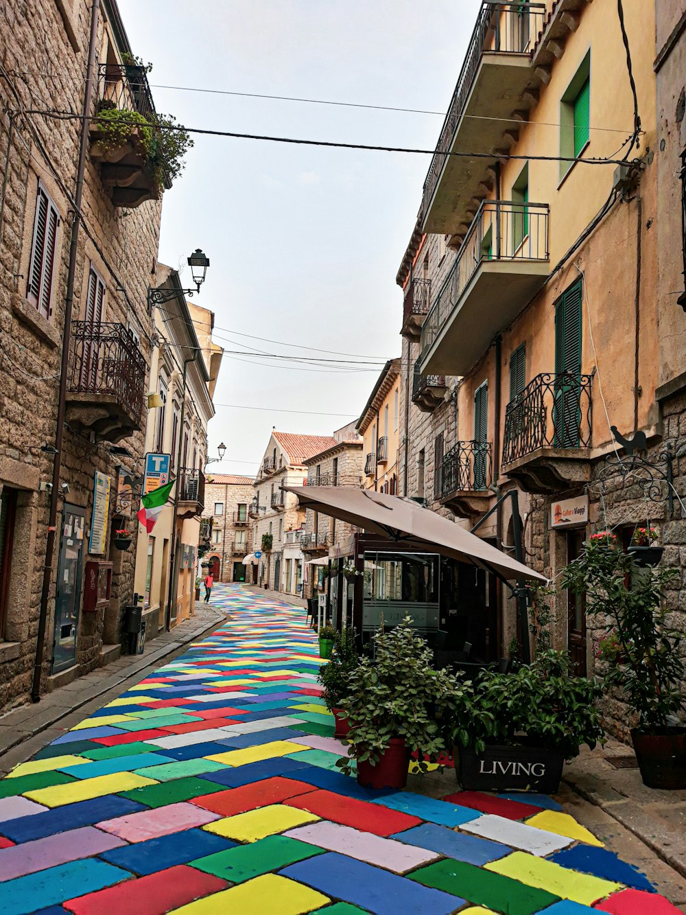 a colorful street with buildings on both sides