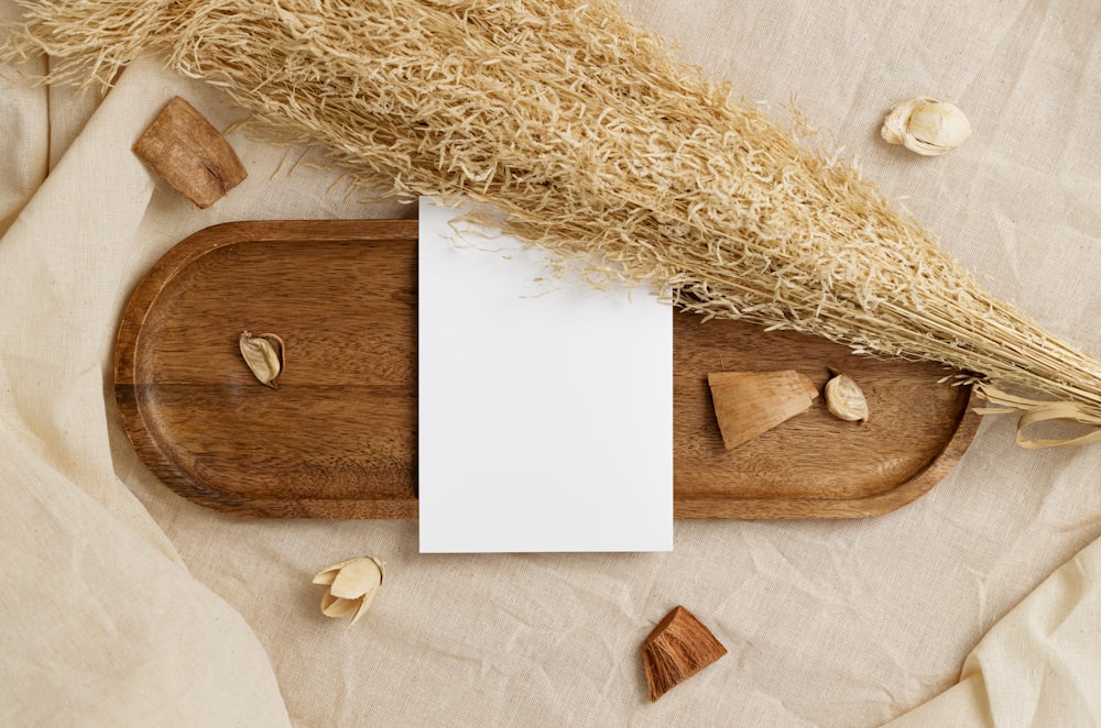 a wooden box with a piece of paper and a piece of wood