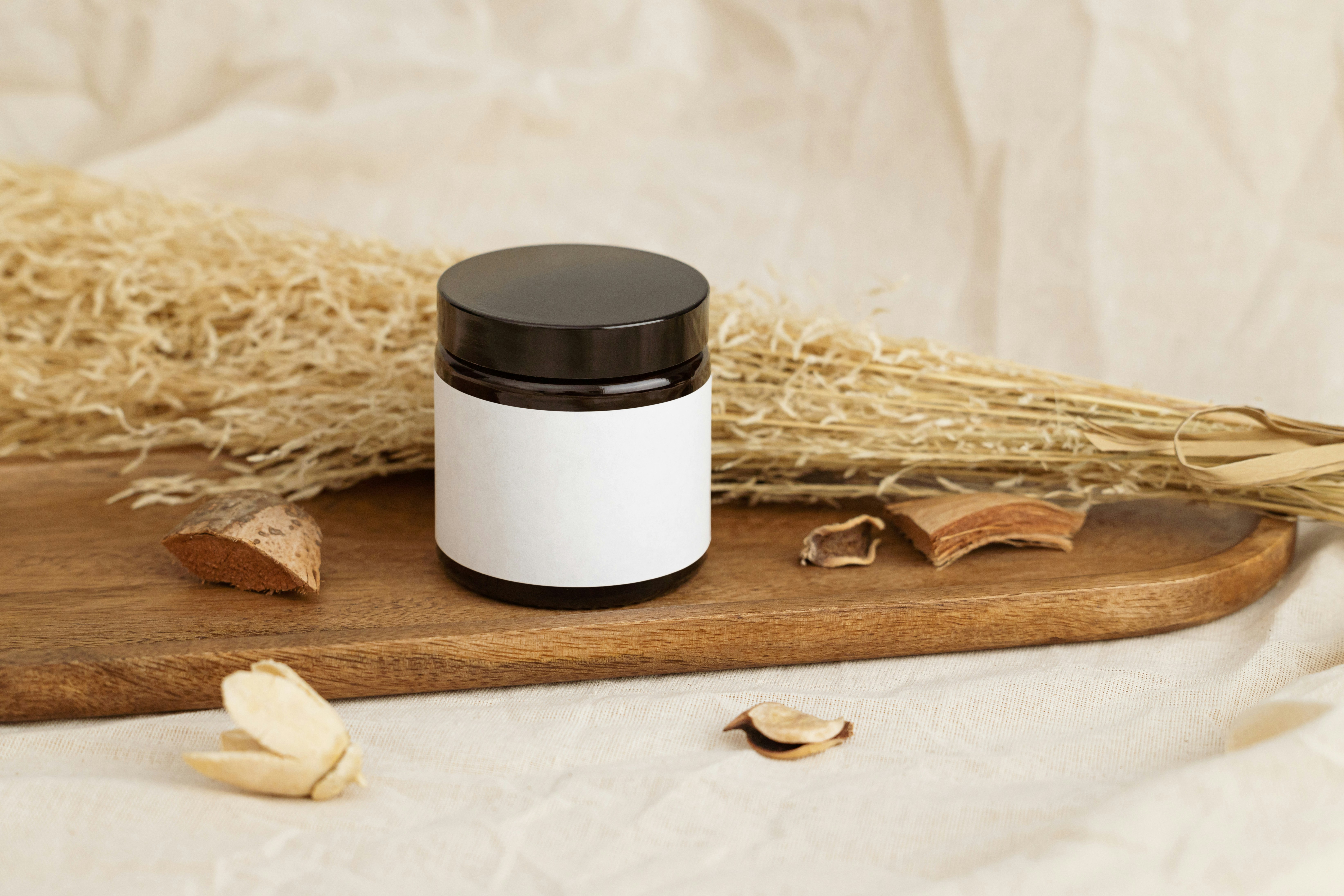 Small black container with white substance