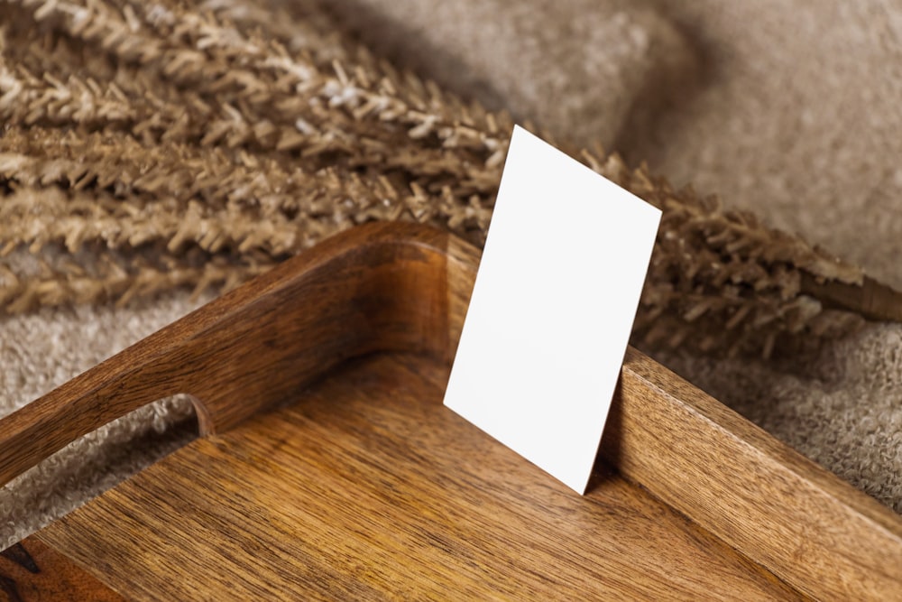 a piece of wood with a piece of paper on it