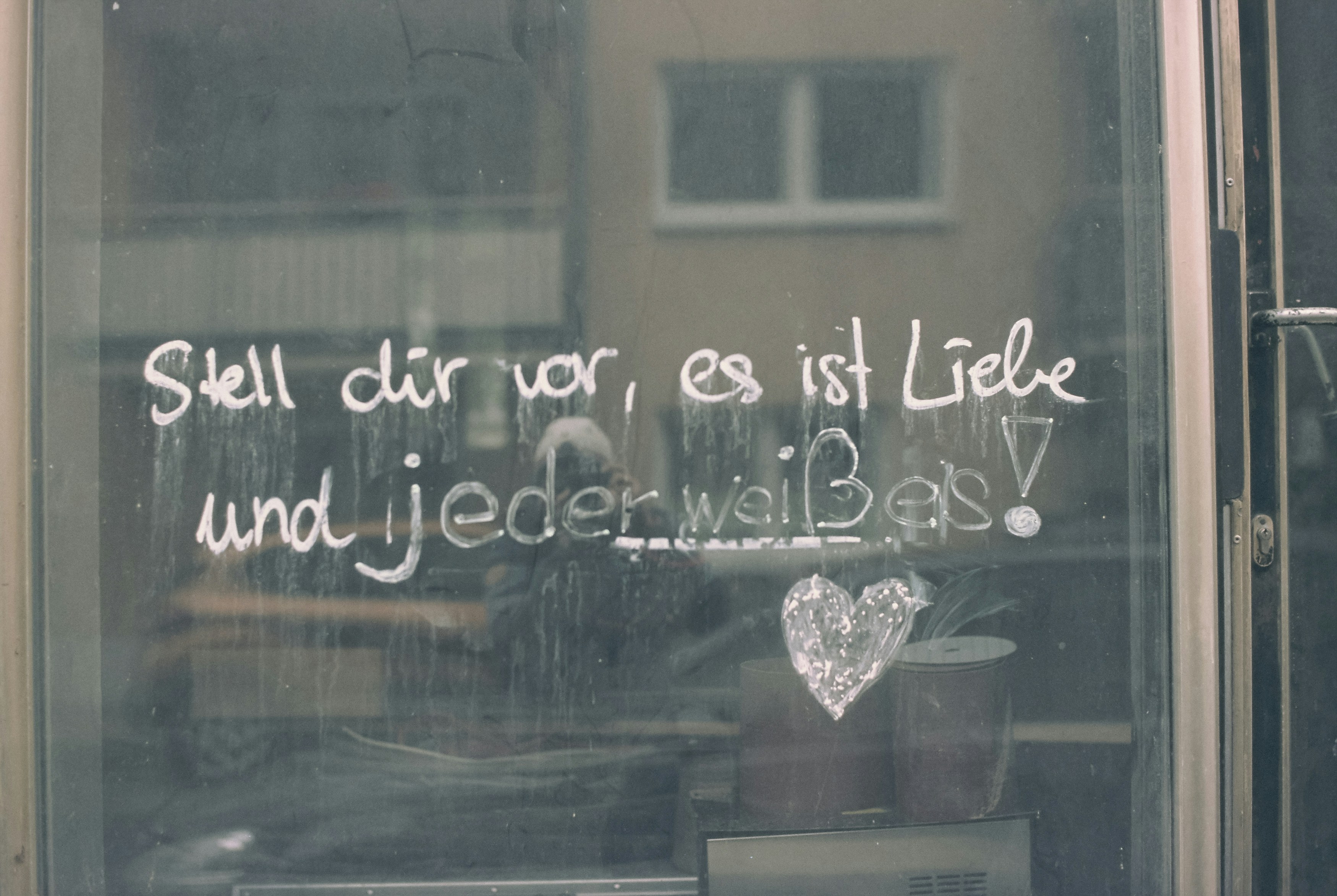 a window with writing on it