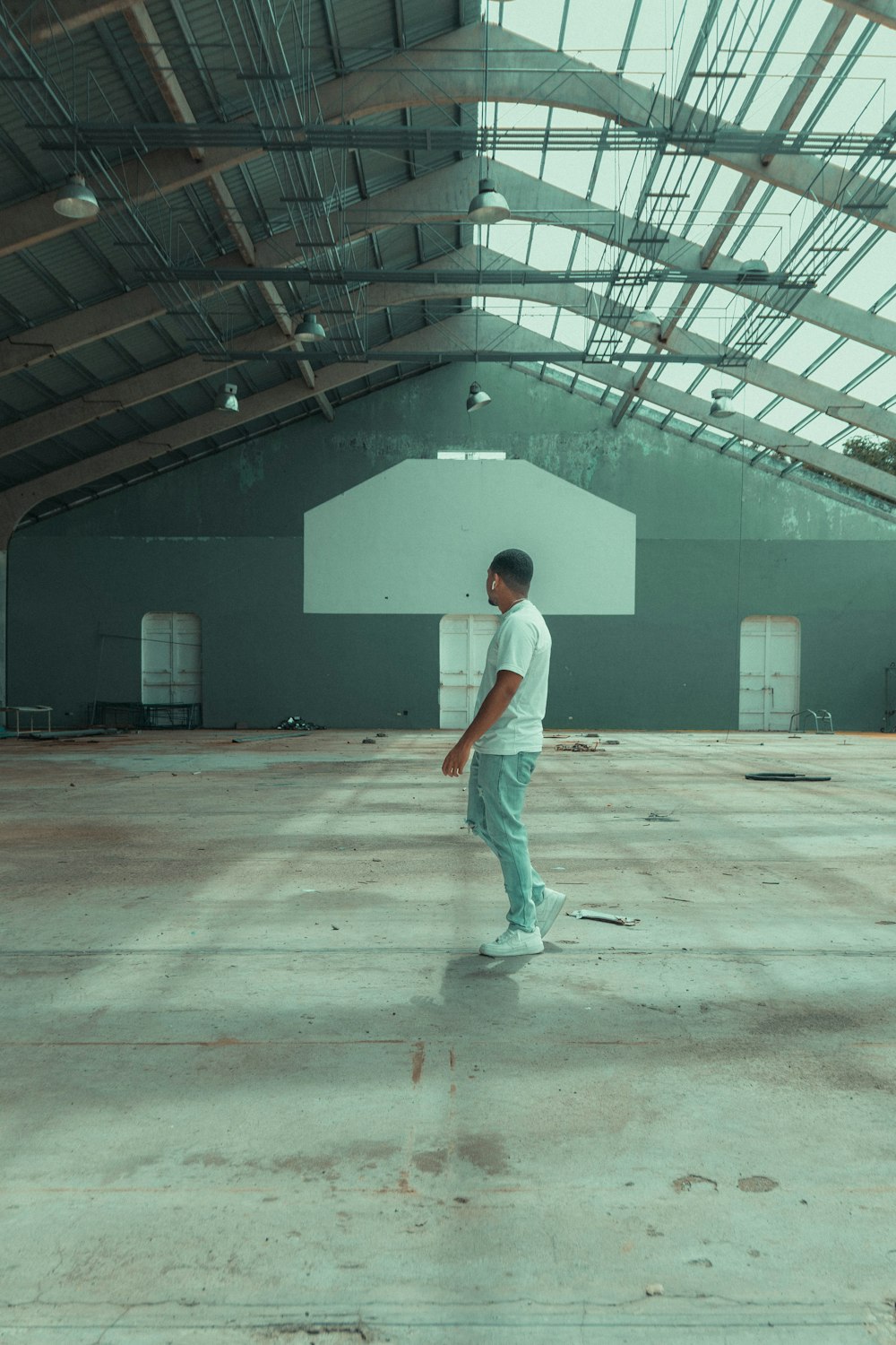 a man walking in a large room
