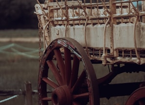 a boat with a wooden wheel