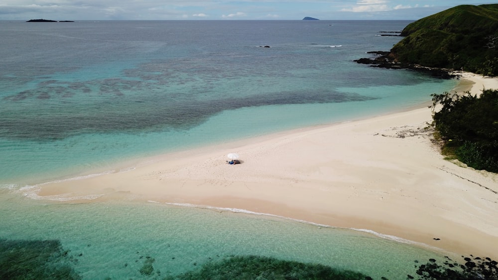 a beach with blue water