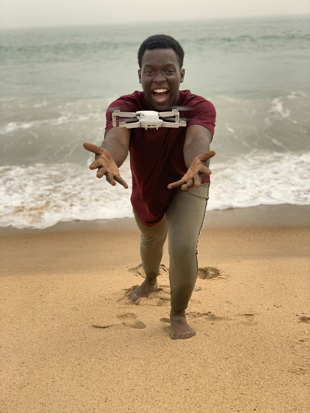 a man running on a beach