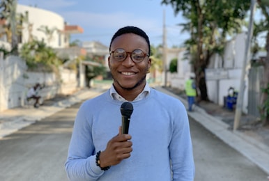 a man holding a microphone