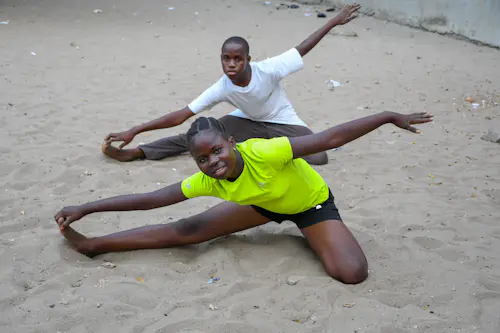 A trainer and client at a gym