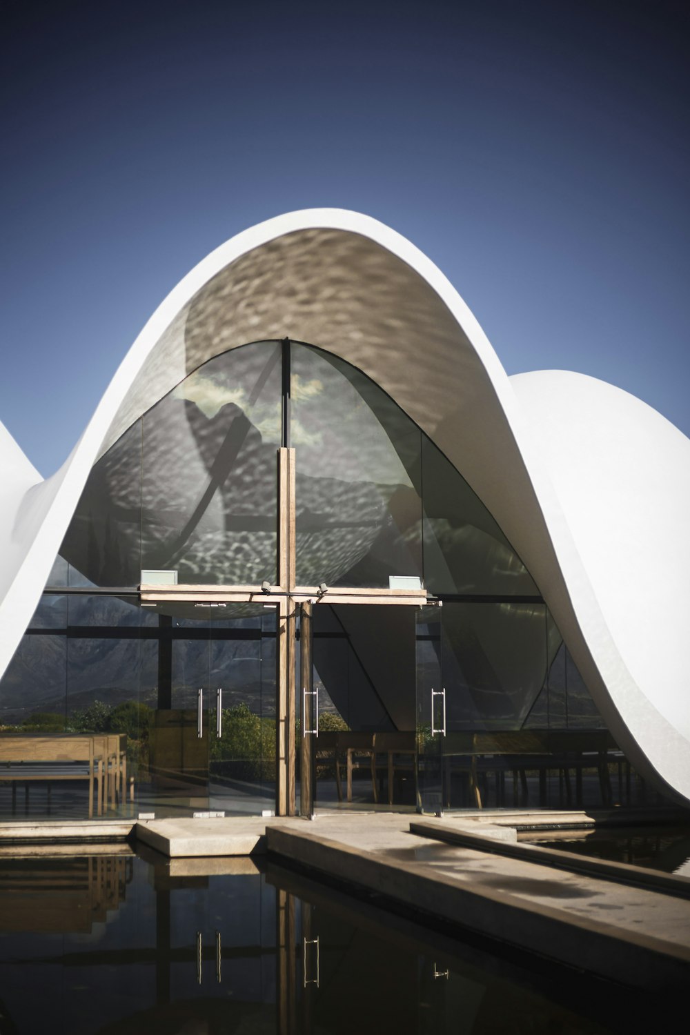 a large white building with a round dome