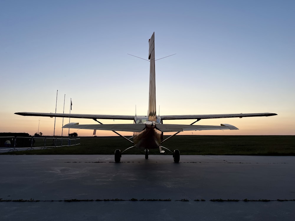 a small airplane on the runway