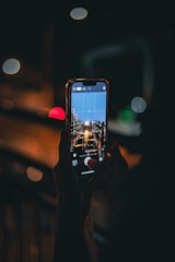 a person holding a cell phone