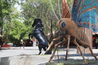 a statue of a horse and a person