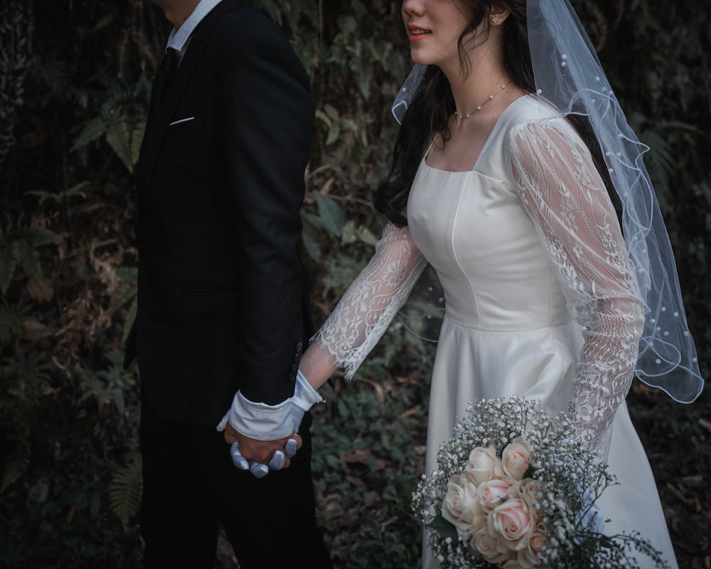 a man and woman in wedding attire