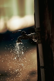 a water faucet on a window