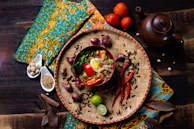 An artistic presentation of spicy noodles with vibrant colors.