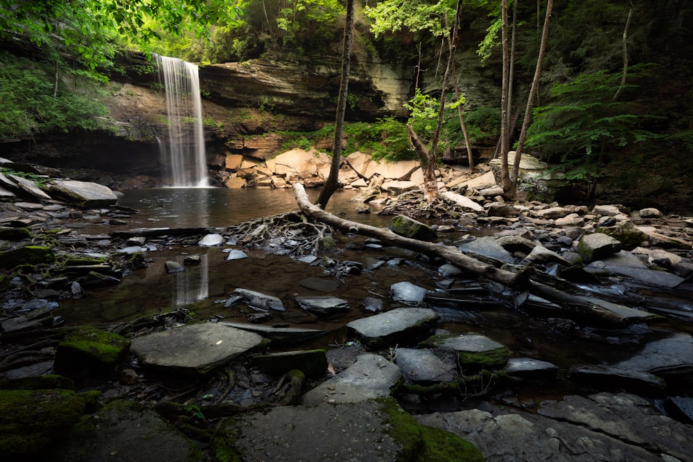 a waterfall over a small waterfall