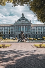 a statue in front of a building