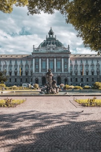 a statue in front of a building