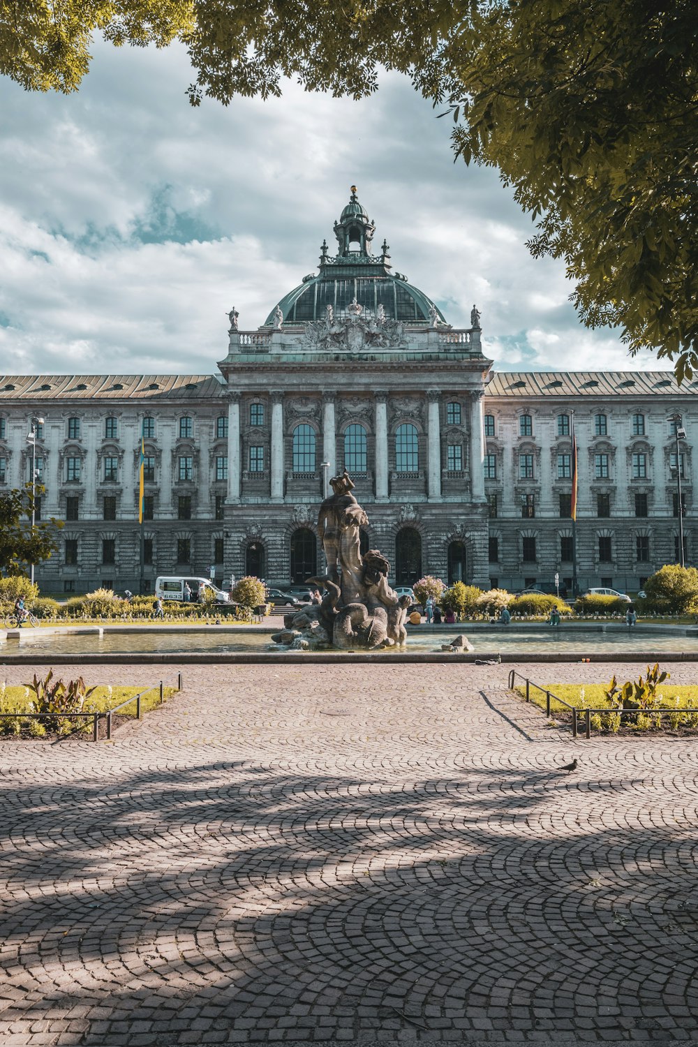 a statue in front of a building