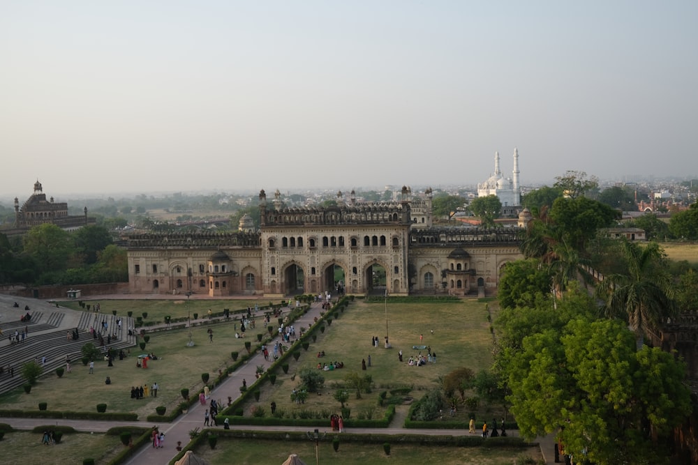 a large building with many people in front of it