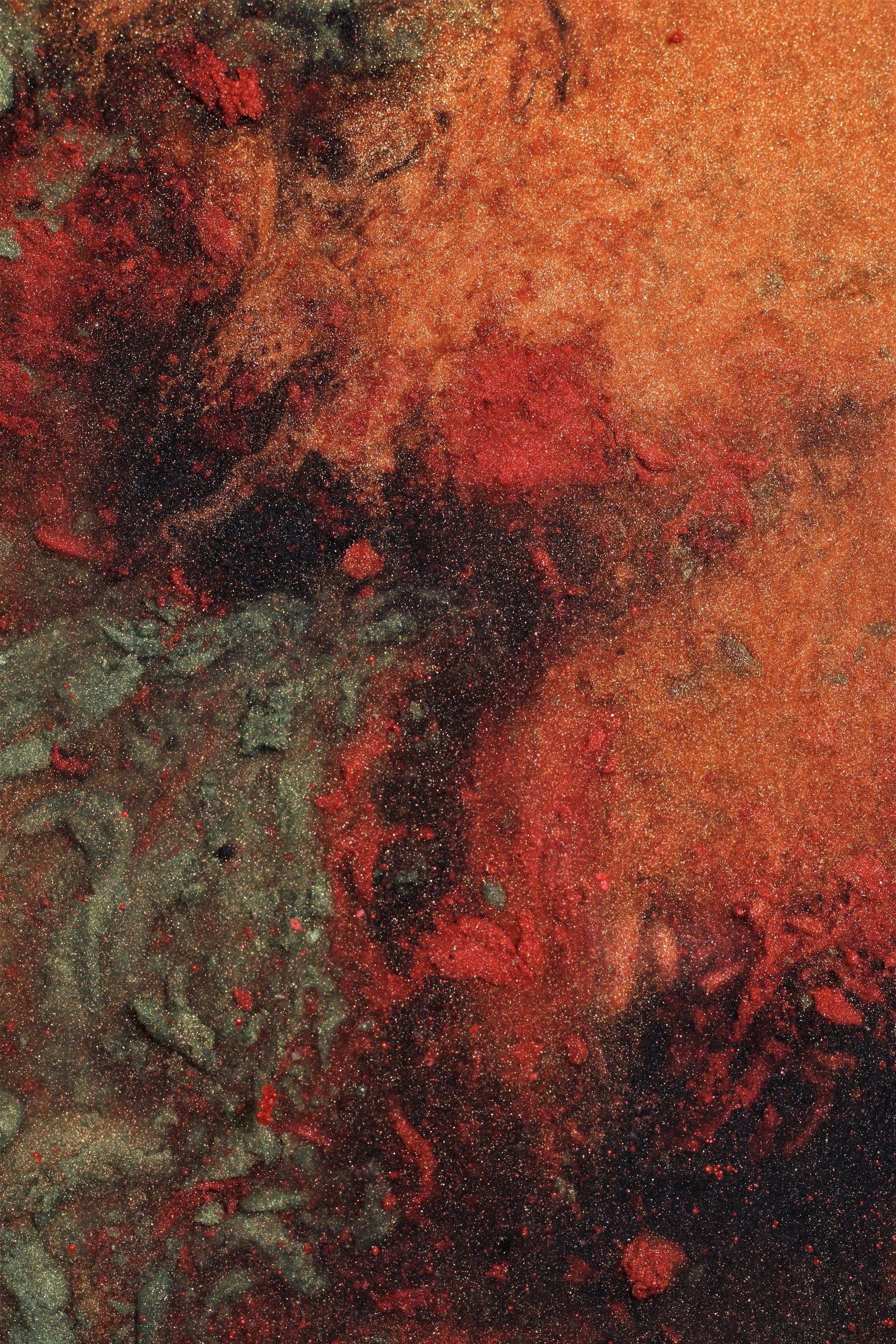 An acrylic artwork featuring textured layers in rich terracotta and ochre, evoking deep emotional states.