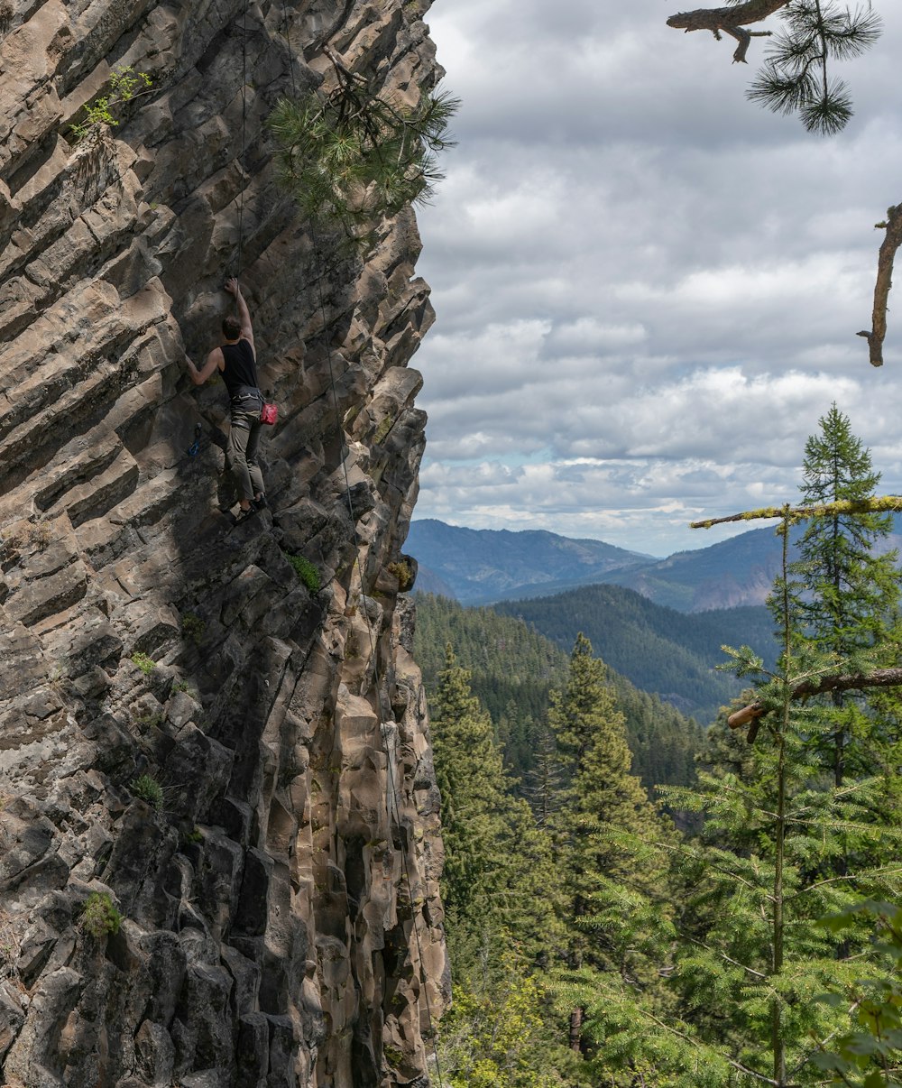 a person climbing a rock