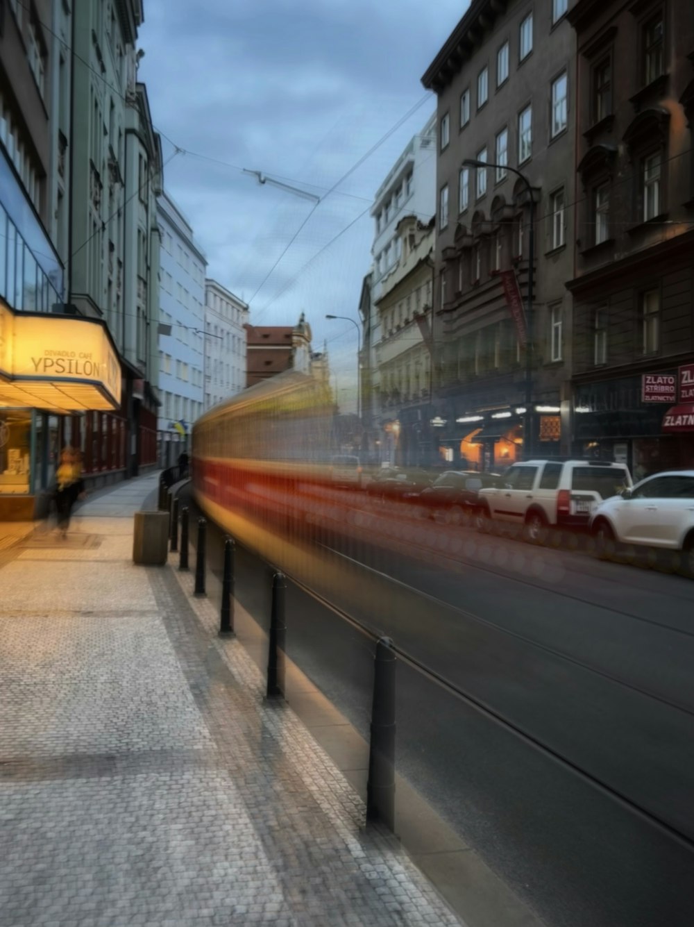 a street with cars parked along it