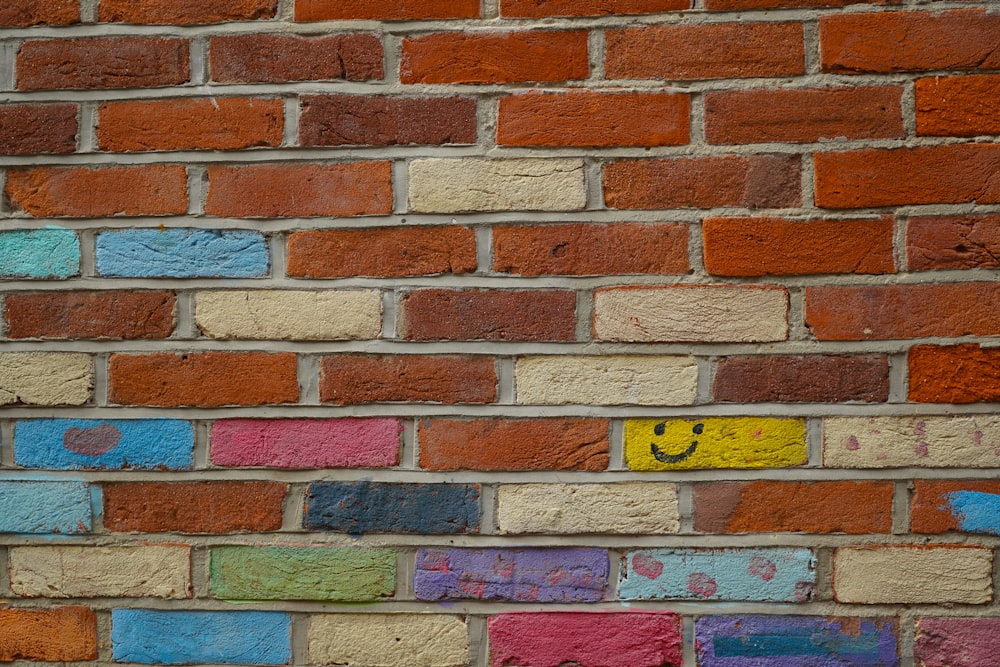 a brick wall with a sign on it