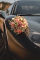 a bouquet of flowers on a car