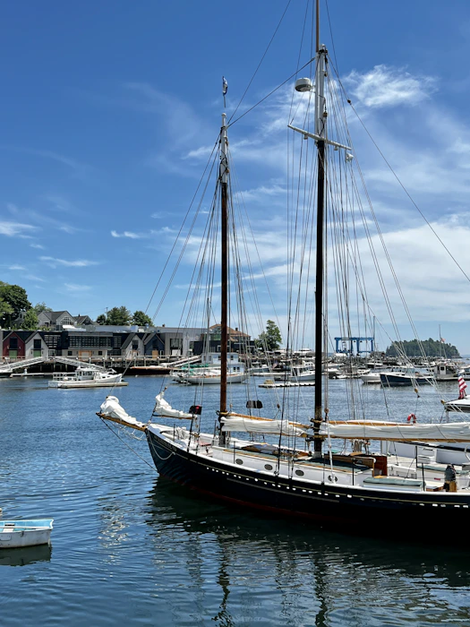 a large sailboat docked