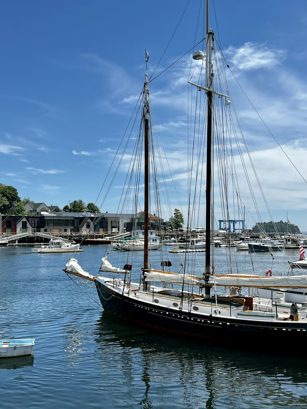 a large sailboat docked